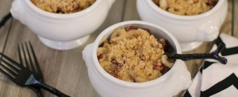 Lobster macaroni and cheese on a decorated tablescape.