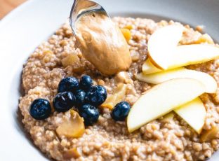 Simply Nature cashew butter poured over steel cut oats.